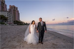 Pelican grand beach resort wedding organic moments photography